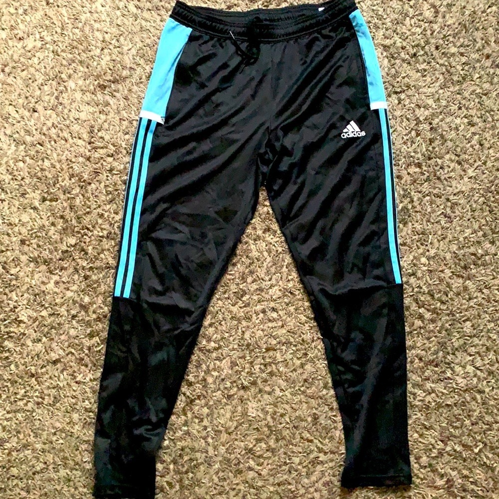 Adidas sweatpants with Carolina blue stripes